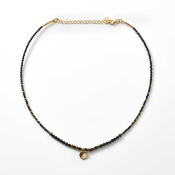 collier de perles spinelle noire et hématite breloque disque plaqué or